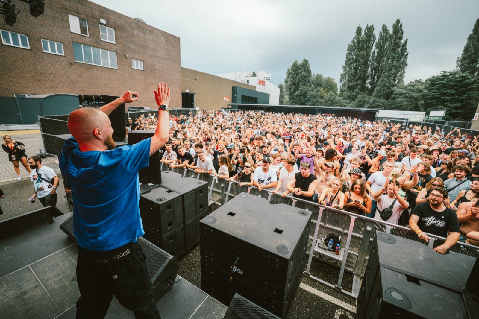 MC hyping the crowd from stage